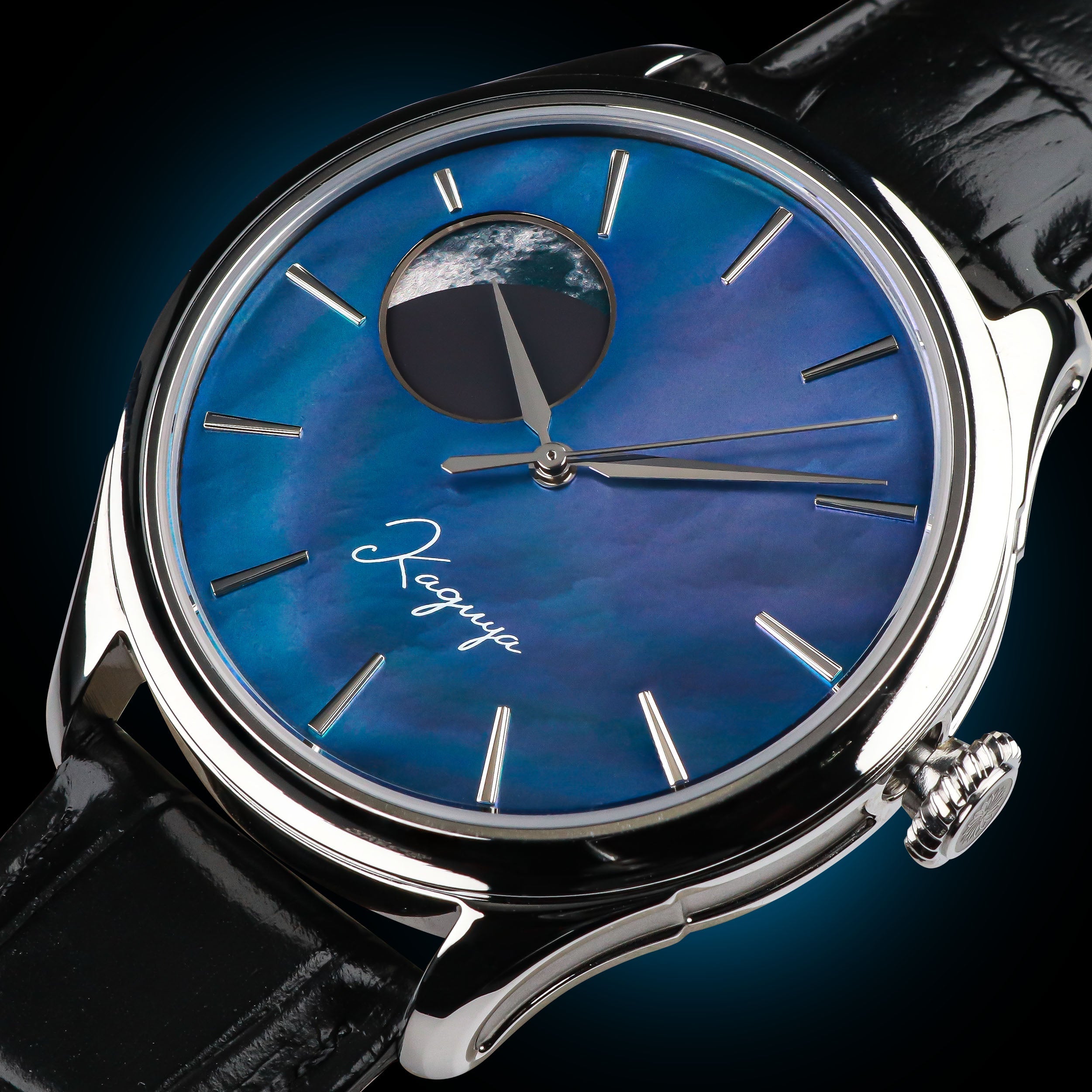 Experience the enchanting Dream Moonphase Kaguya Murasaki Blue - a captivating automatic watch with H7M01 movement and a mesmerizing moonphase feature. Embellished with a Mother of Pearl Blue Raden Dial, this Wancher timepiece tells the timeless story of Princess Kaguya. Immerse yourself in elegance and craftsmanship with this exquisite moonphase watch